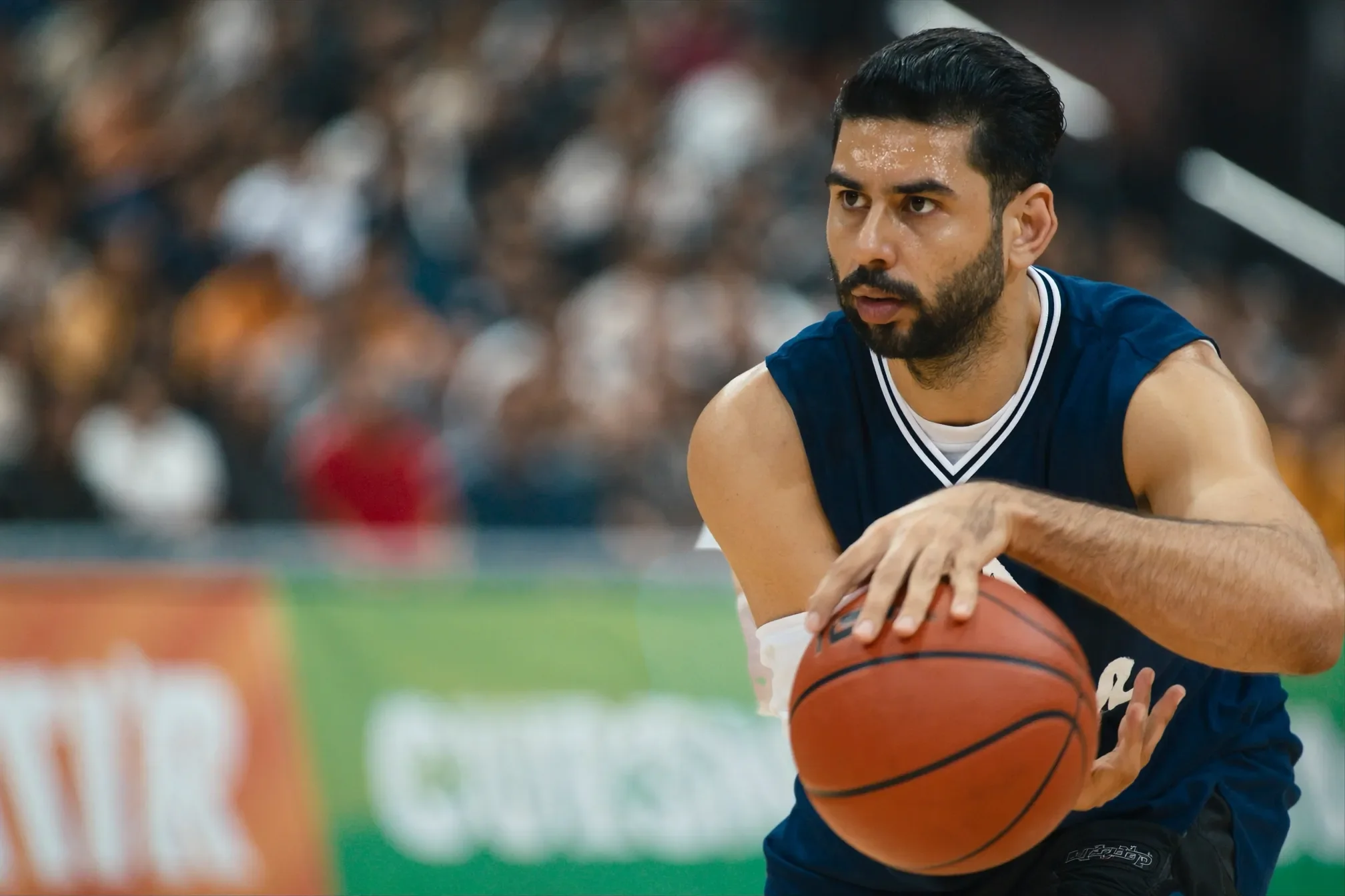Rishabh Reddy holding a basketball on court